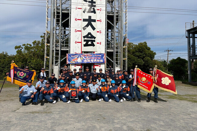 写真：消防操法大会で撮影された集合写真